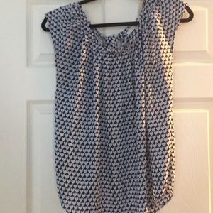 Sleeveless blouse. Light blue and navy.